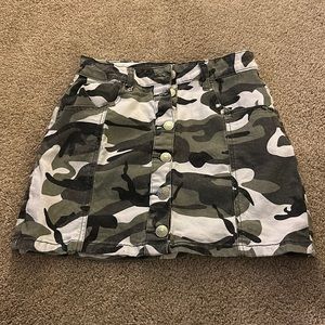 Almost famous. Camo high rise skirt. Rarely worn